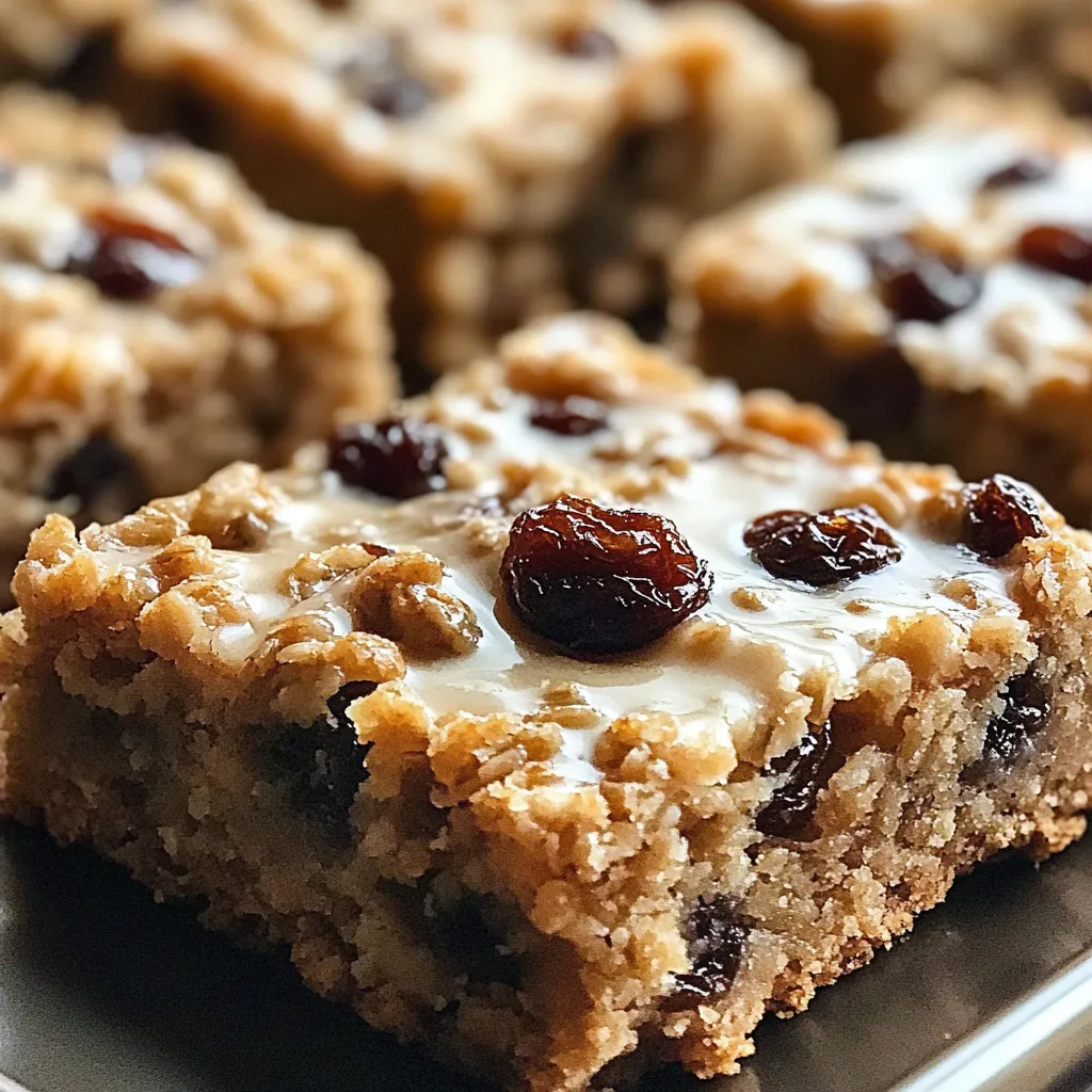 Close view of a square dessert with raisins.